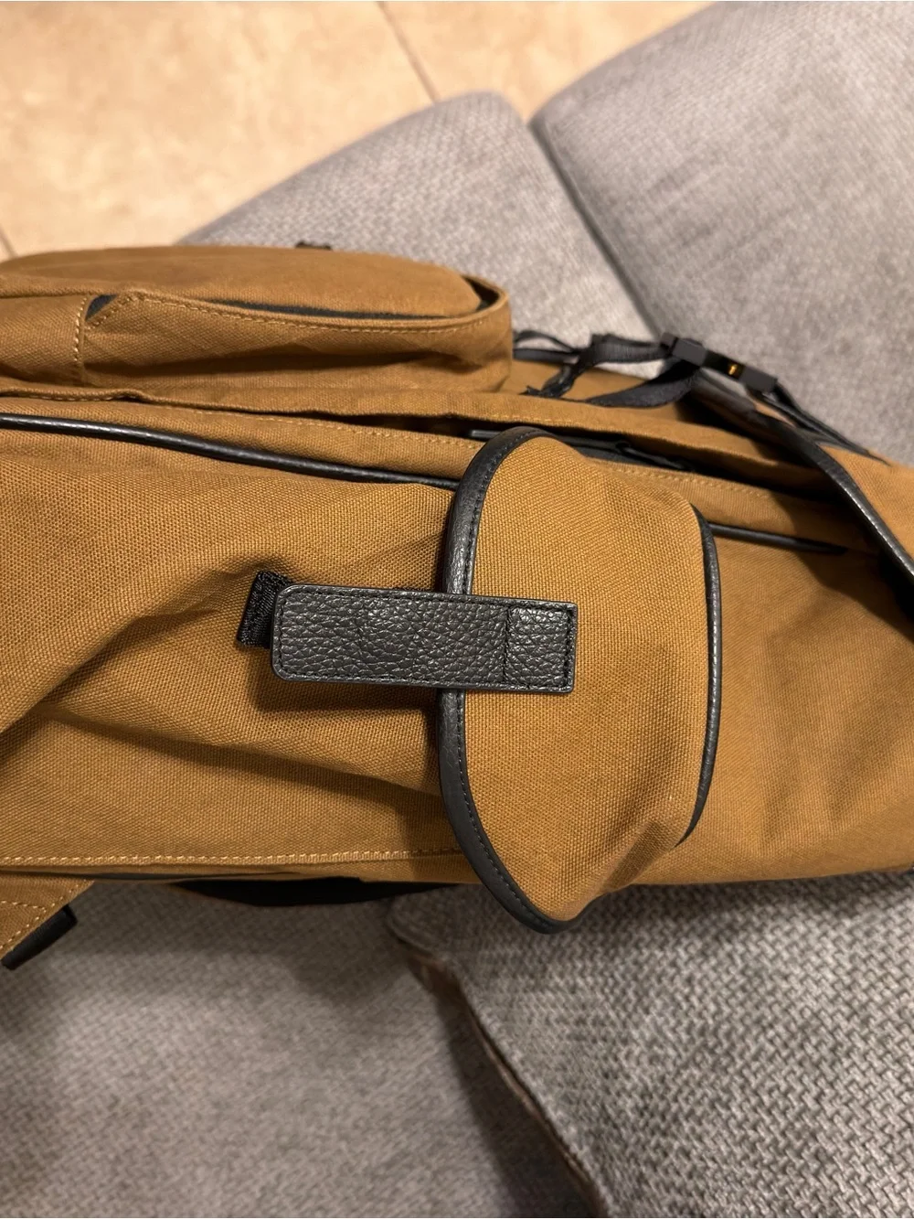 Men's Tan Canvas Travel Backpack with Black Trim
